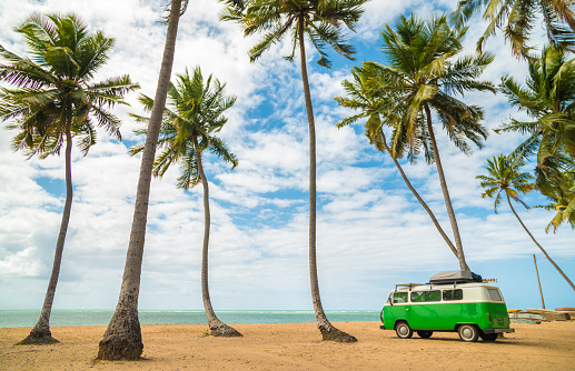 Japaratinga, Alagoas, Brazil - August 21: Volkswagen Kombi Van during a trip parks in Japaratinga beach.