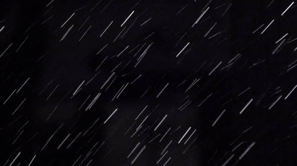 istock Heavy rain at night. Abstract background 1023532670