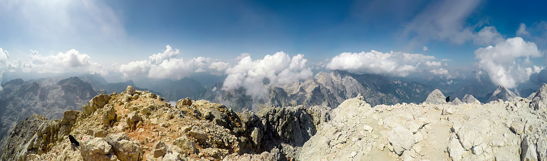 Mountaineer pov to expedition climbing to rocky mountain summit Triglav on Julian Alps mountain range