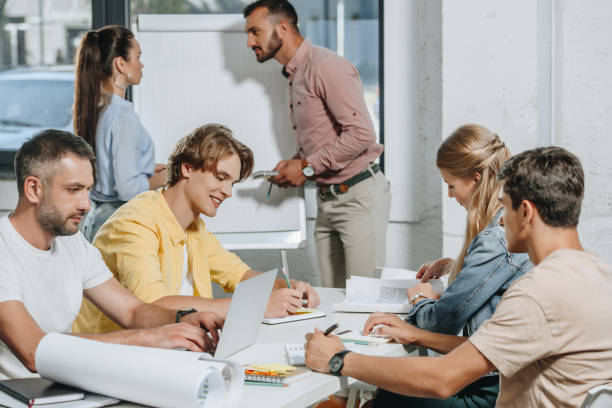 istock businesspeople working on project during meeting in office 1023534536