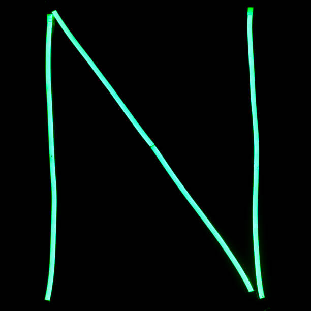 istock Green neon lights alphabet letters 1023542378