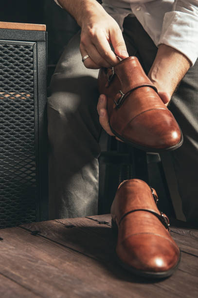 istock The shoemaker puts new monk shoes on the table 1023543458