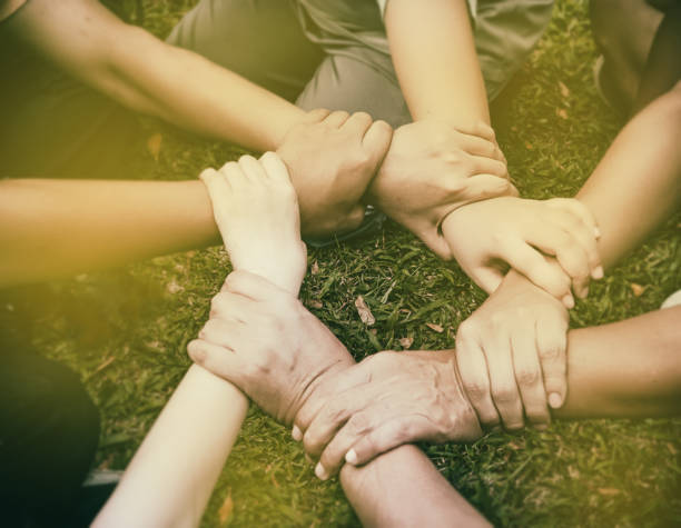 istock The human hands is touching together,United hands together,expressing positive,teamwork concept 1023563790