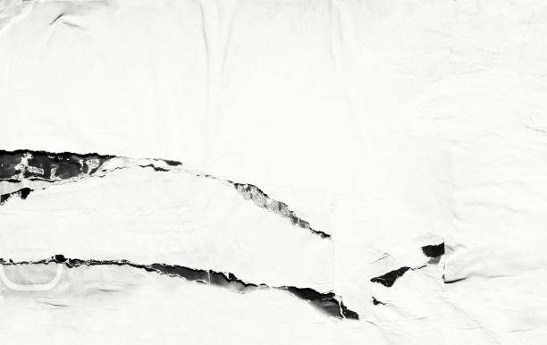 istock Blank old ripped torn paper crumpled creased posters grunge textures backdrop backgrounds 1023566728