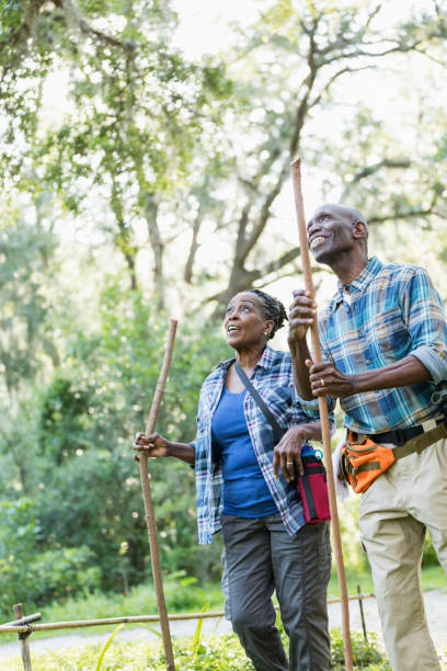 istock Senior African-American couple hiking, exploring 1023567174