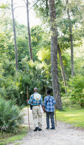 istock Senior African-American couple hiking, exploring 1023567762