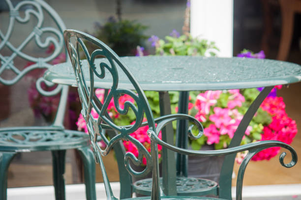 istock Wrought Iron table outside on a patio. 1023578544