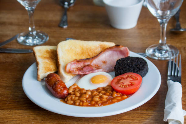 istock Full english breakfast with all the trimmings. 1023578572