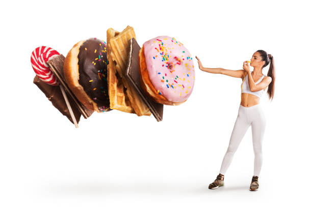 istock Fit young woman saying NO to sweets 1023578946