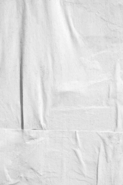 istock Blank old ripped torn paper crumpled creased posters grunge textures backdrop backgrounds 1023579442