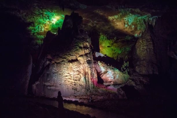 istock high influx in the karst cave with green illumination 1023579718