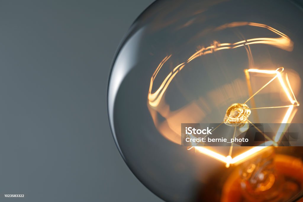 Close up glowing light bulb Lightbulb Close-upLightbulb Close-up Light Bulb Stock Photo