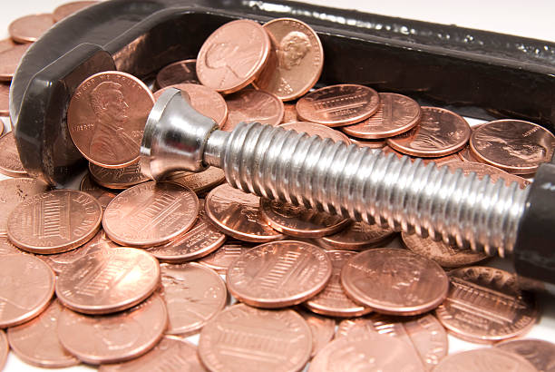 Pinching Pennies stock photo