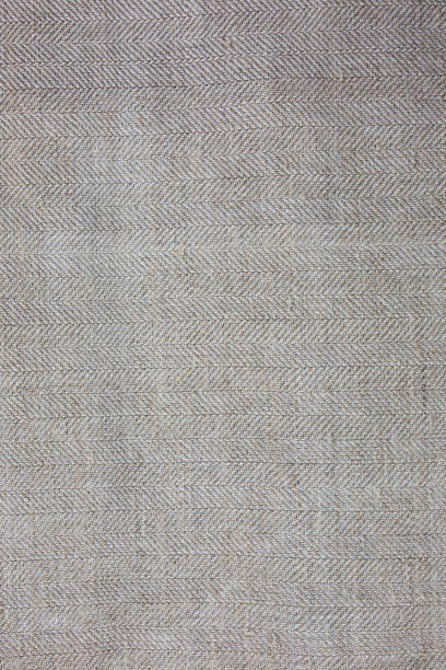 istock Rustic linen tablecloth. Old vintage fabrics. Stylish texture background. Vertical photo. 1023594306