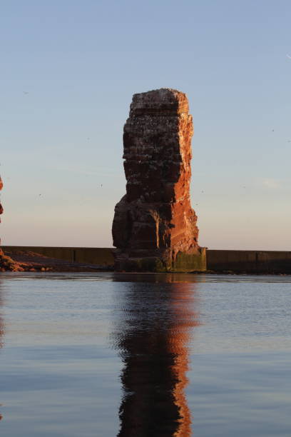 istock Sunset on the rocky coast, sunset on Helgoland in Germany 1023601462