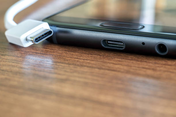 istock New fast USB Type-C port on mobile phone and cable close-up 1023602564