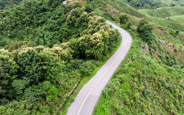 istock Asphalt curved highway on mountain 1023603146