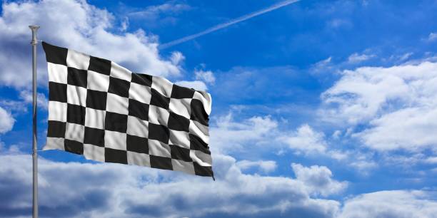 istock open-wheel single-seater car waving flag on blue sky. 3d illustration 1023607440