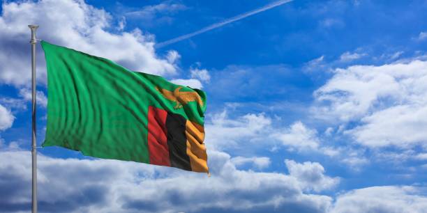 istock Zambia waving flag on blue sky. 3d illustration 1023607458
