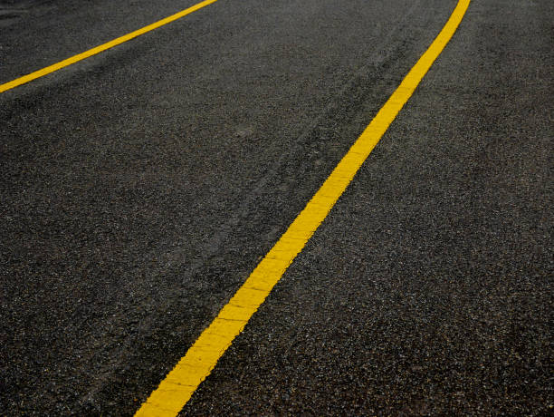 istock Asphalt surface of road with lines abstract background 1023607616