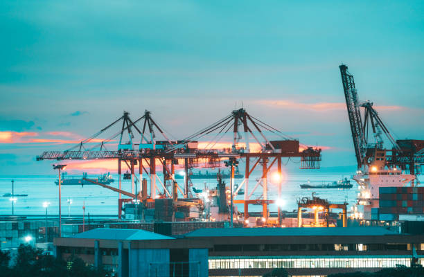 istock Industrial cargo cranes in Manila bay, Philippines 1023608944