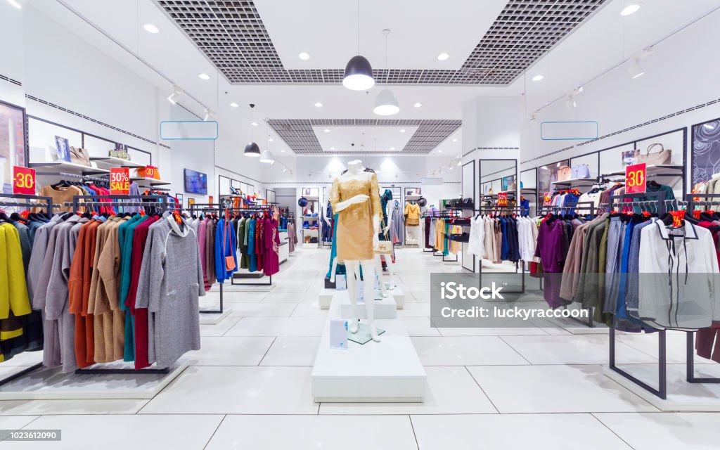 Interior of clothing store. Interior of fashion clothing store for women. Clothing Store Stock Photo