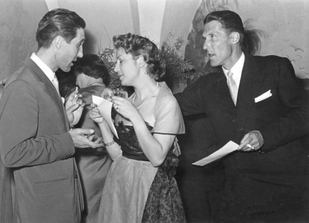 1950 two couple at a party - high society men tuxedo party imagens e fotografias de stock