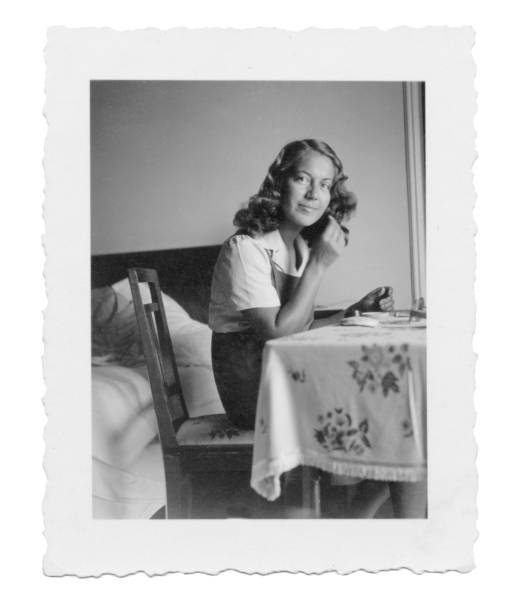 istock 1941,Beautiful young woman put make up on face 1023615572