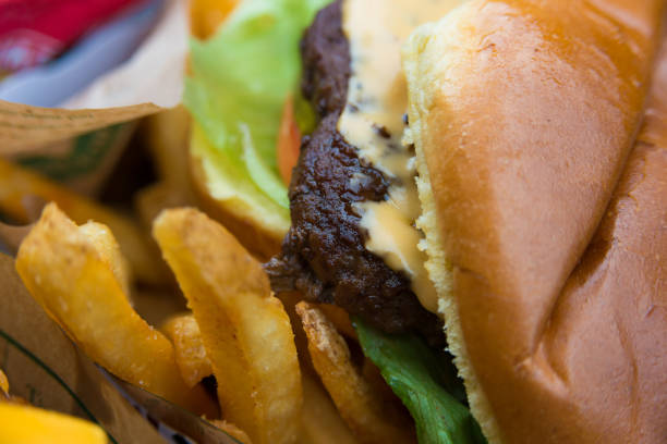 istock Delicious fresh burger close up. Selective focus with shallow depth of field 1023616836