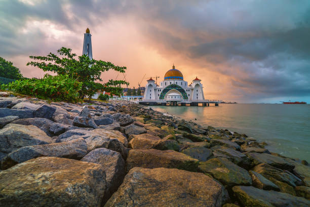 Sunrise over the majestic mosque, Malacca Straits Floating Mosque (Masjid Selat Melaka). stock photo