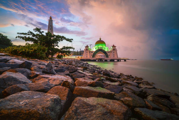 istock Sunrise over the majestic mosque, Malacca Straits Floating Mosque (Masjid Selat Melaka). 1023627814
