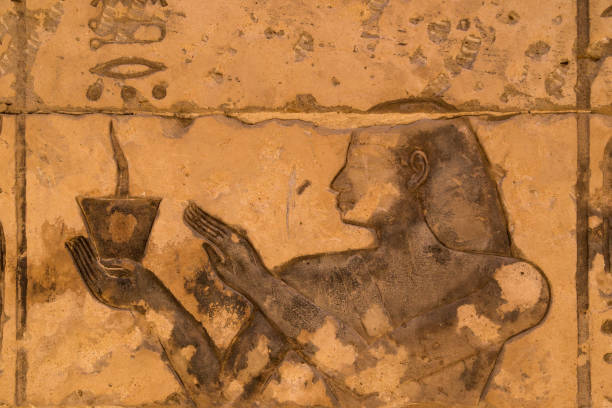 istock Egyptian carving figures and hieroglyphs in Luxor, Egypt. 1023629376