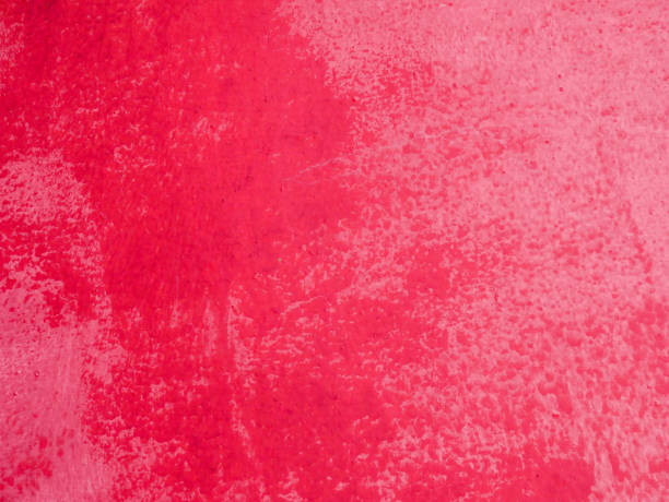 istock red painted concrete wall textured abstract background 1023639226