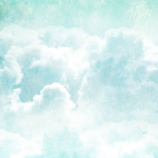 istock Grunge background with paper texture and clouds 1023642930