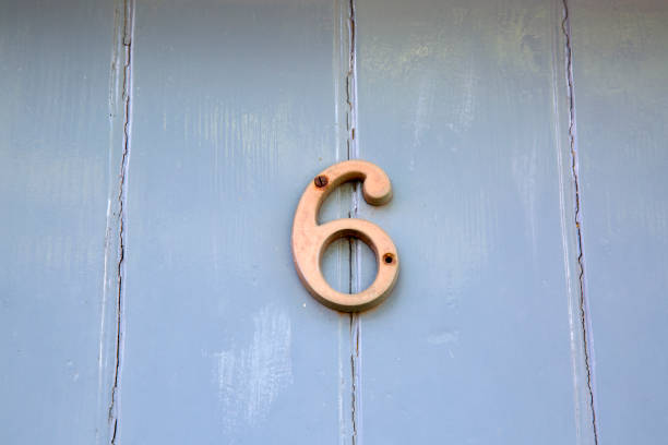 istock Number Six on Grey Door 1023659172