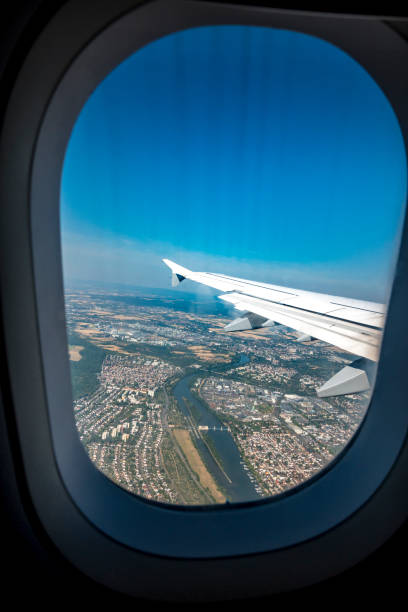 istock looking out of airplane window 1023675180