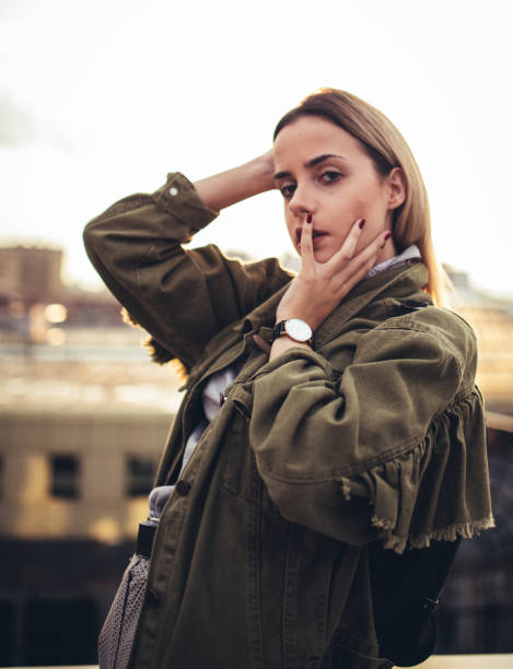 istock Beautiful young woman on the rooftop 1023683366