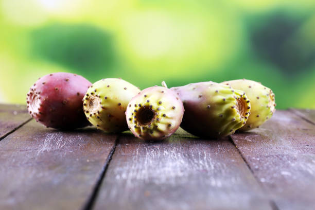 Fruits of the prickly pear cactus on a rustic table