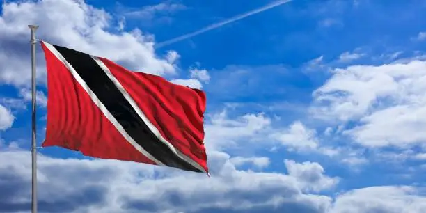 Trinidad and Tobago waving flag on blue sky background. 3d illustration