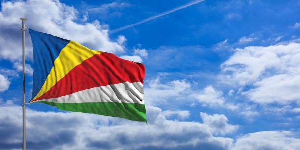istock Seychelles waving flag on blue sky. 3d illustration 1023715974