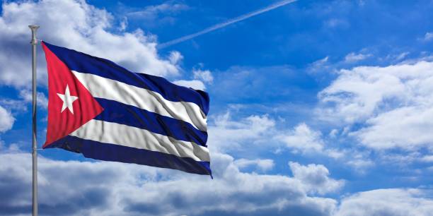 istock Cuba waving flag on blue sky. 3d illustration 1023716428