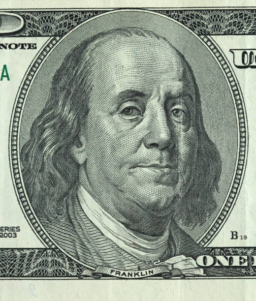 istock Money photo. One hundred dollars with one note 1023738420