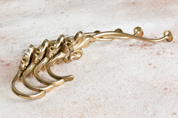 istock Vintage brass hooks hangers 1023741714