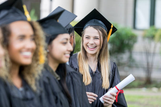 istock Cheerful Hispanic young woman graduates college 1023742024