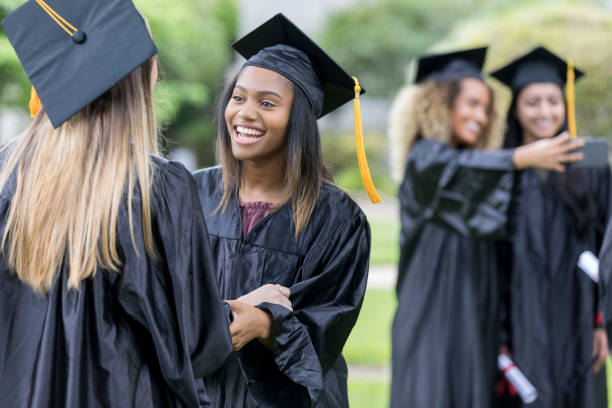 istock Excited college friends after graduation 1023742026