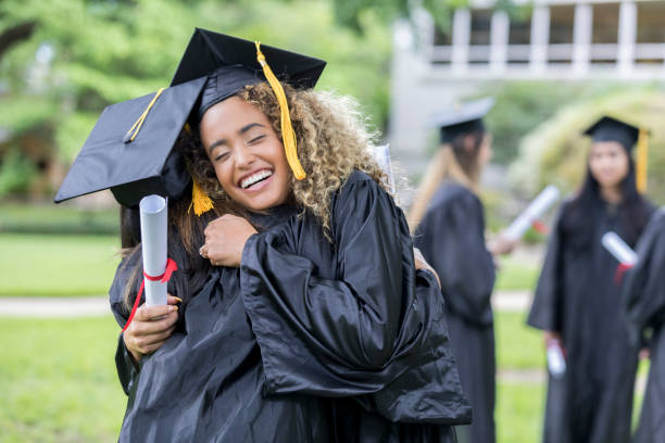 istock Female college friends embracing 1023742028