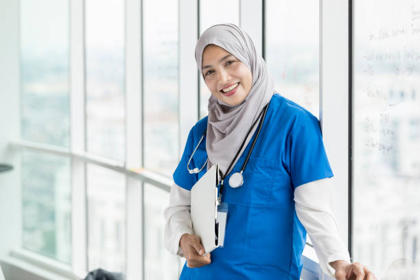 istock Confident female nurse 1023744474