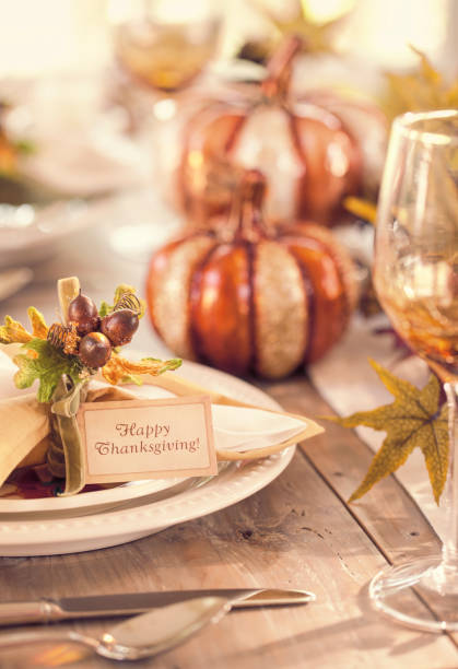 istock Thanksgiving holiday autumn place setting with place card (vertical) 1023754720