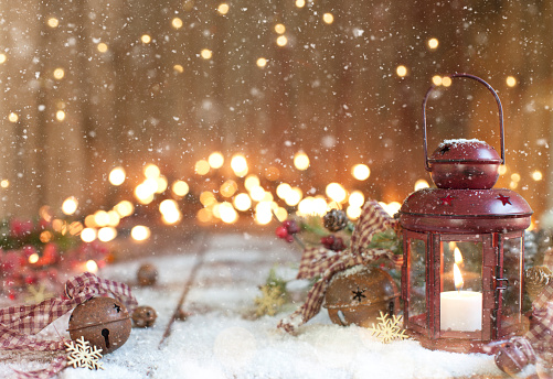 Christmas Red Lantern on an Old Wood Background