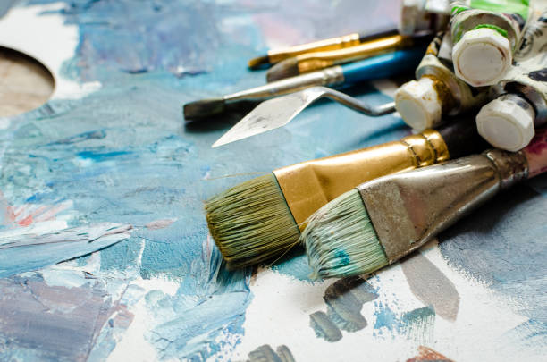 Artist Paint Brushes And Oil Paint Tubes Stock Photo - Download